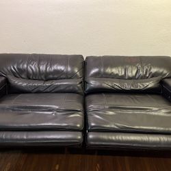 Black leather reclining sofa 