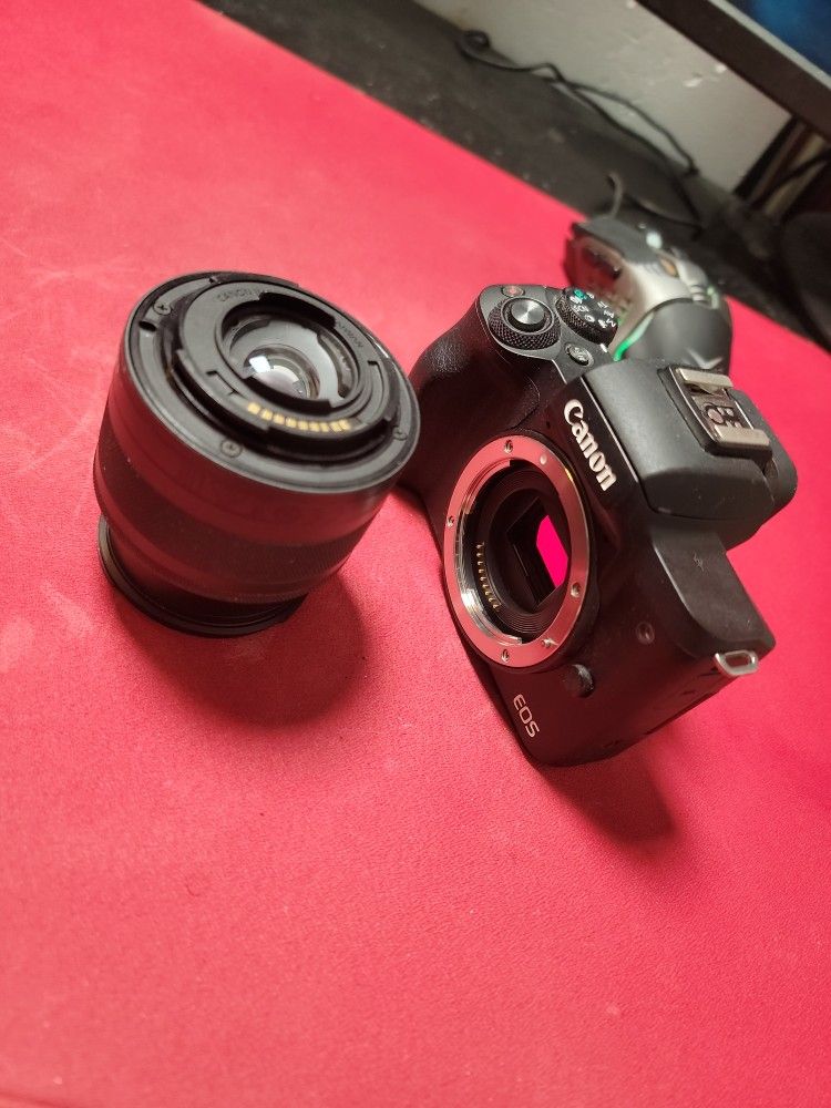Canon M50 With Kit Lens Normal Battery And Dummy Battery To Use While Charging
