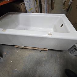 Kohler
Bellwether Collection 60" X 32  Three Wall Alcove Cast Iron Soaking Bath Tub