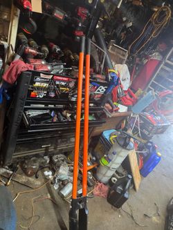 Orange post hole diggers