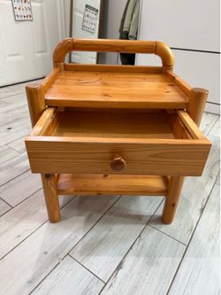 Wooden side table with drawer