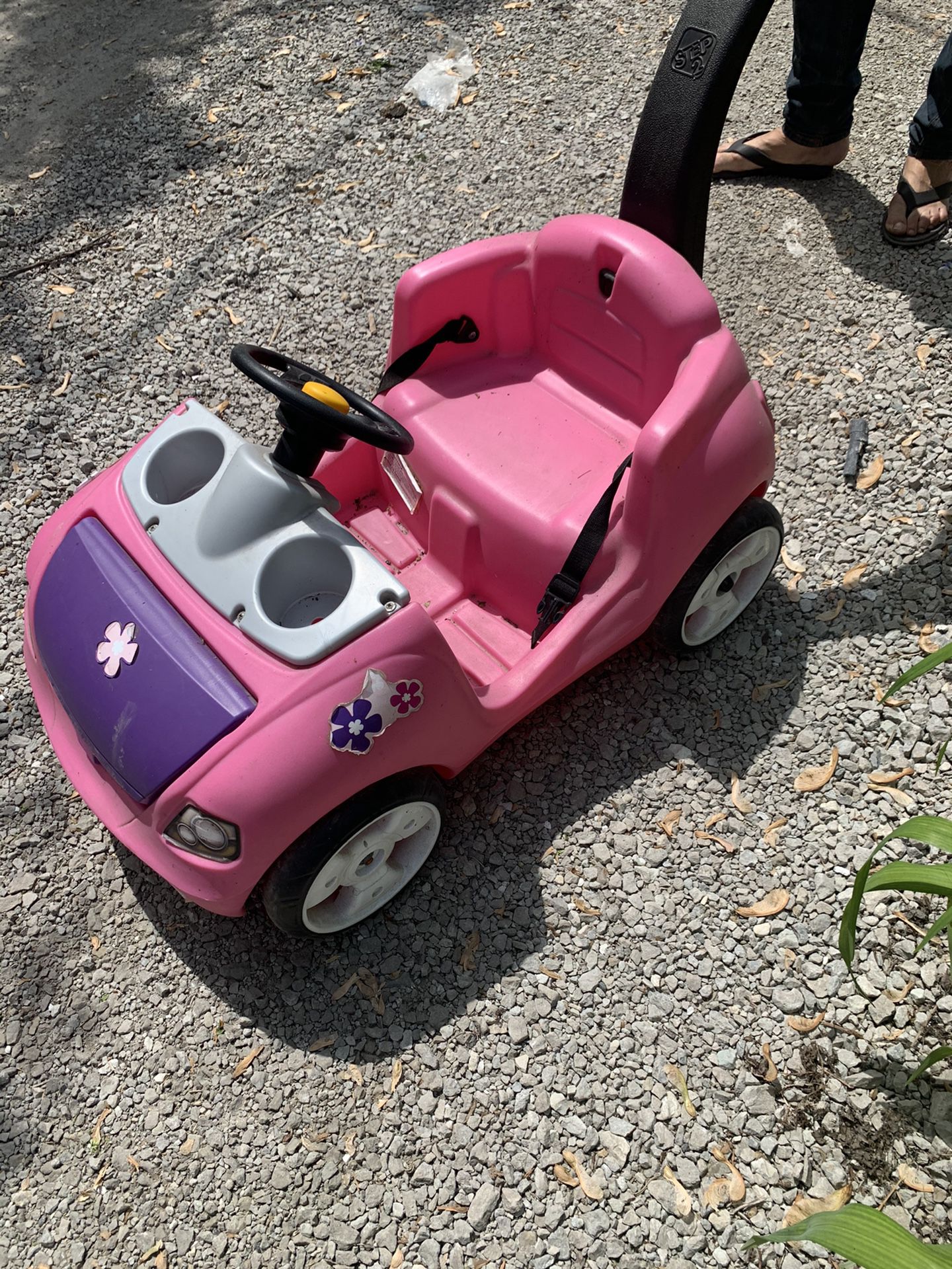 Kids Pink push stroller car. With steering wheel, horn, drink holder, storage compartment