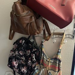 Multiple Woman’s Purses And Some Wallets