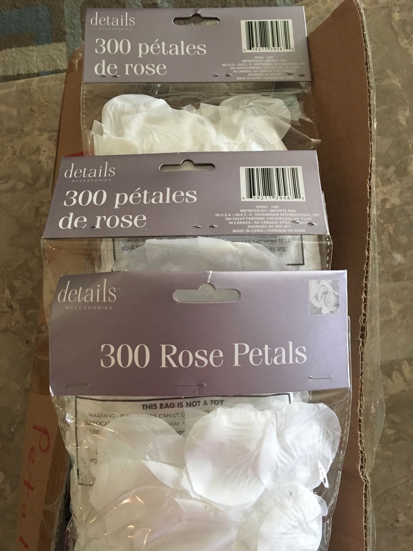 20 packages of 300 count white rose petals