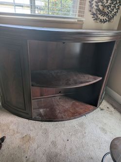 Curved wooden entertainment table