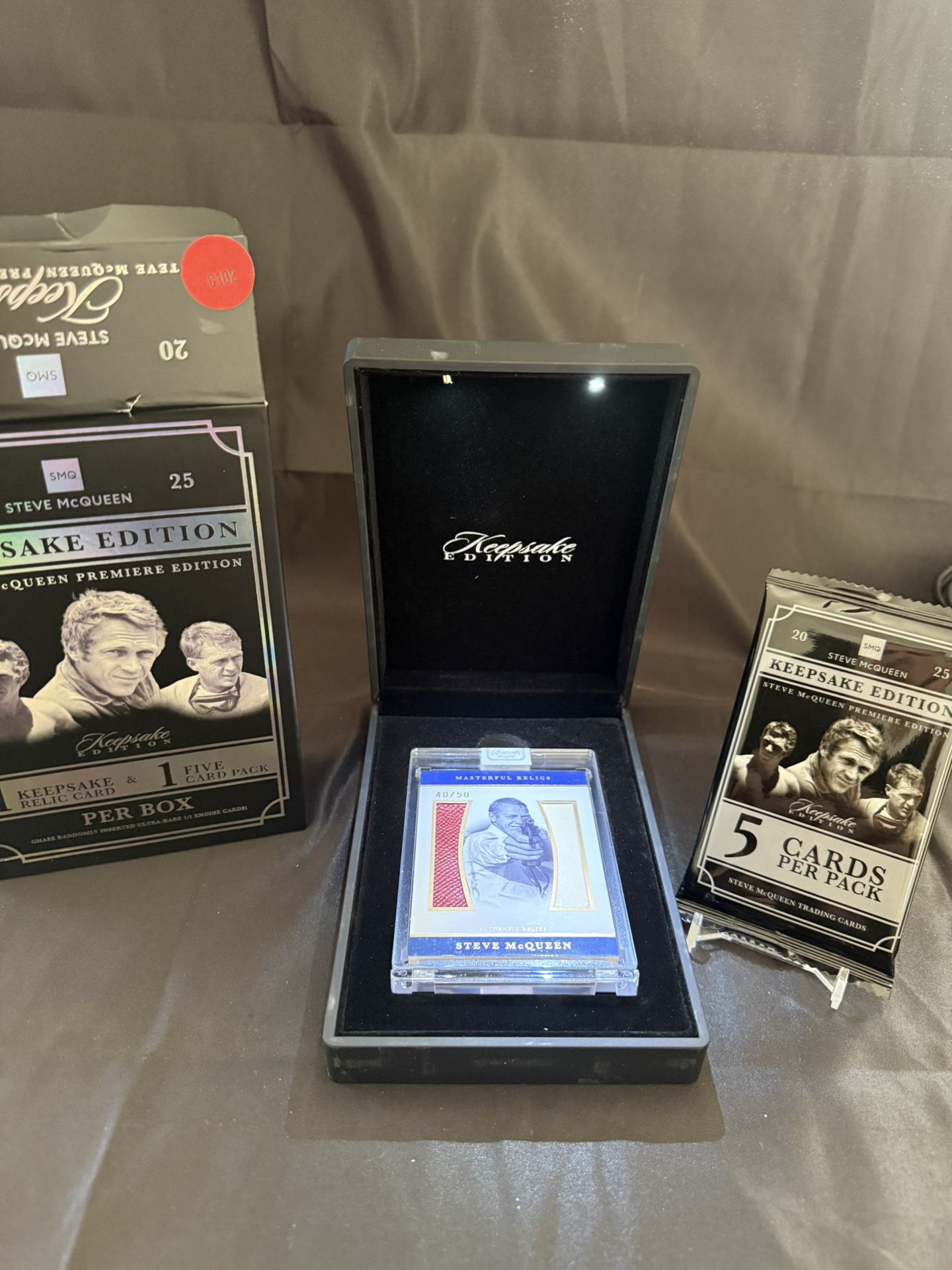 2025 Super Break Steve McQueen Keepsake Premiere Edition 40/50 DUAL Relic card.Includes light up keepsake box and a sealed pack of cards The 2025 S