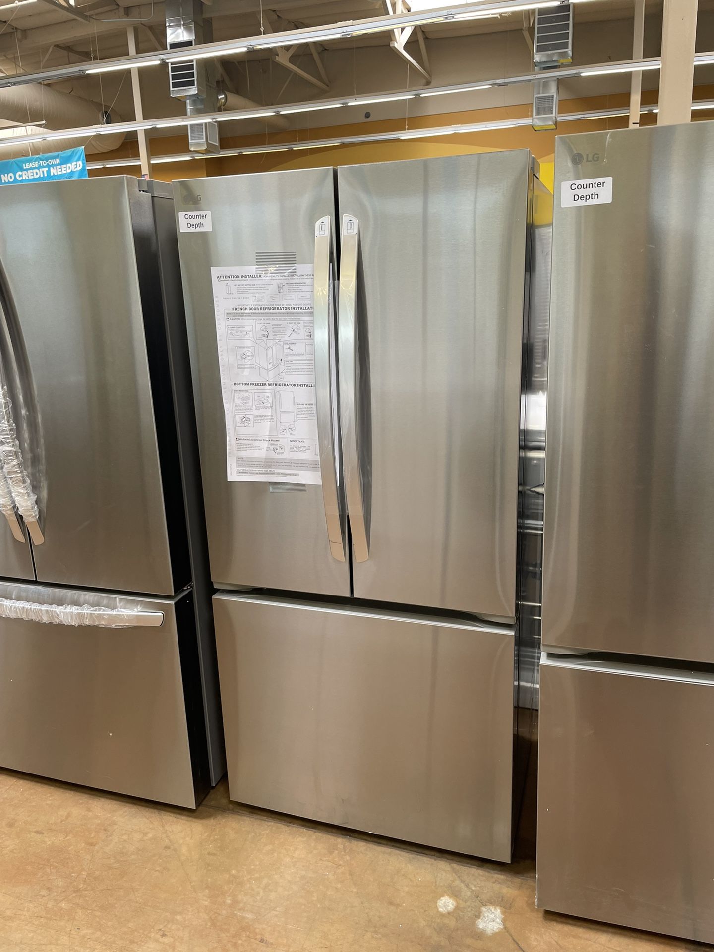 LG 33 inch wide stainless steel refrigerator French door with ice counter depth