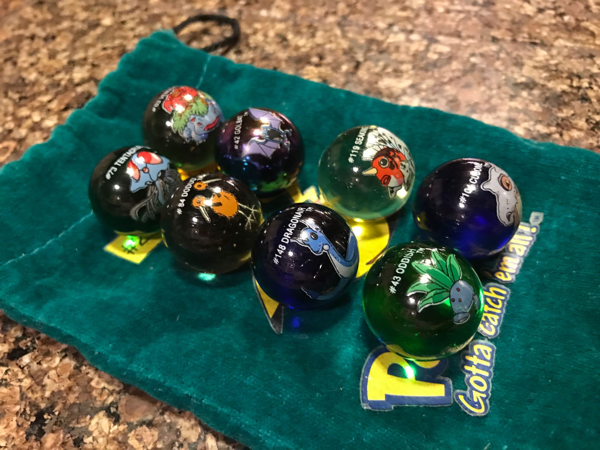 Vintage Pokémon glass marbles with #25 Pikachu bag