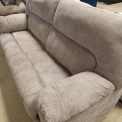 Entertainment Quadruple Reclining Couch And Loveseat 