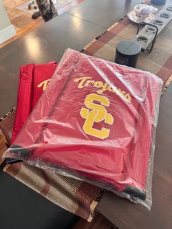“Logo” brand stadium seats “USC”