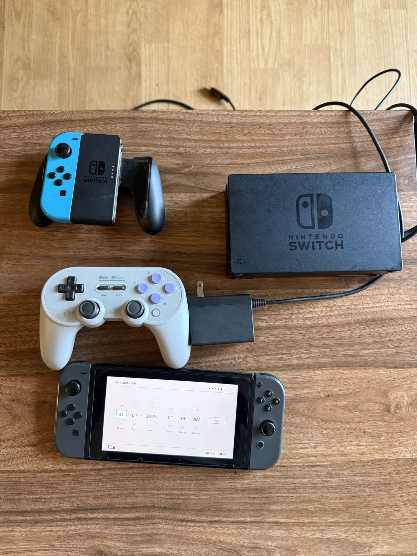 Nintendo Switch With SD Card Cables And Controllers