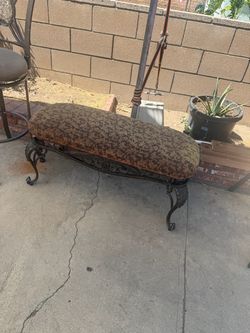 Ornate Upholstered Bench with Metal Base