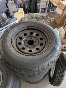 Trailer tires st205x75xr15 on 5 on 5 lug black rims