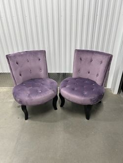 2 Purple tufted accent chairs