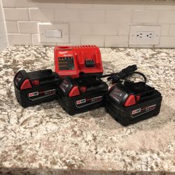 Milwaukee M18 Redlithium Batteries And Charger