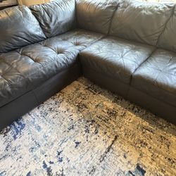 Natuzzi leather sectional couch