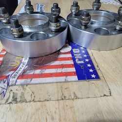 38mm 5x114.3 thread 1.25 with 60.1 mm hub centric wheel spacer. 