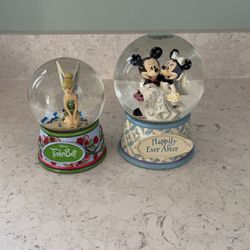 2 Disney Snow Globes Like New