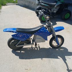 Electric Razor Dirt Bike  and A 4 Wheeler Power Wheel