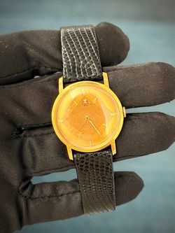 Solid 18 karat yellow gold Gubelin watch 31.3g