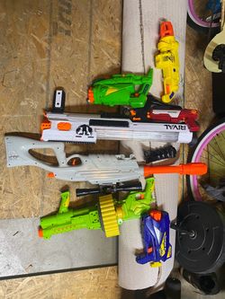 7 nerf fighter guns used in great condition all are working ready for kids or adults to battle with