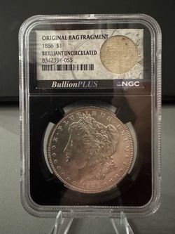 1886 Morgan Silver Dollar NGC BU Original Bag Fragment