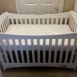 Baby crib and new mattress
