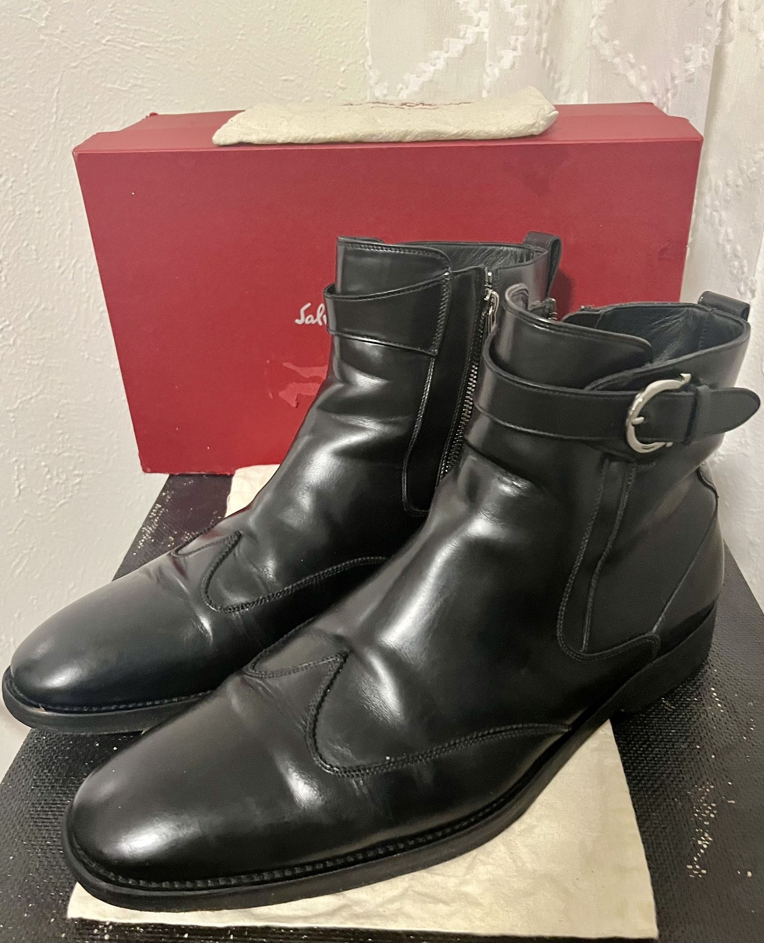 Salvatore Ferragamo “Cyrano” black wingtip Dress Boots.