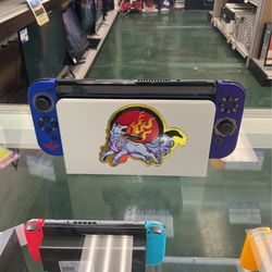 OLED NINTENDO SWITCH W/ LIMITED EDITION SKYWORD SWORD JOYCONS