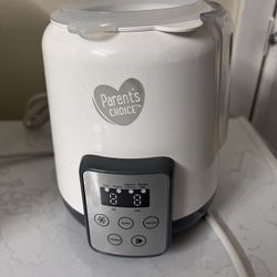 Parent's Choice Bottle Warmer and Sterilizer  .5$ 