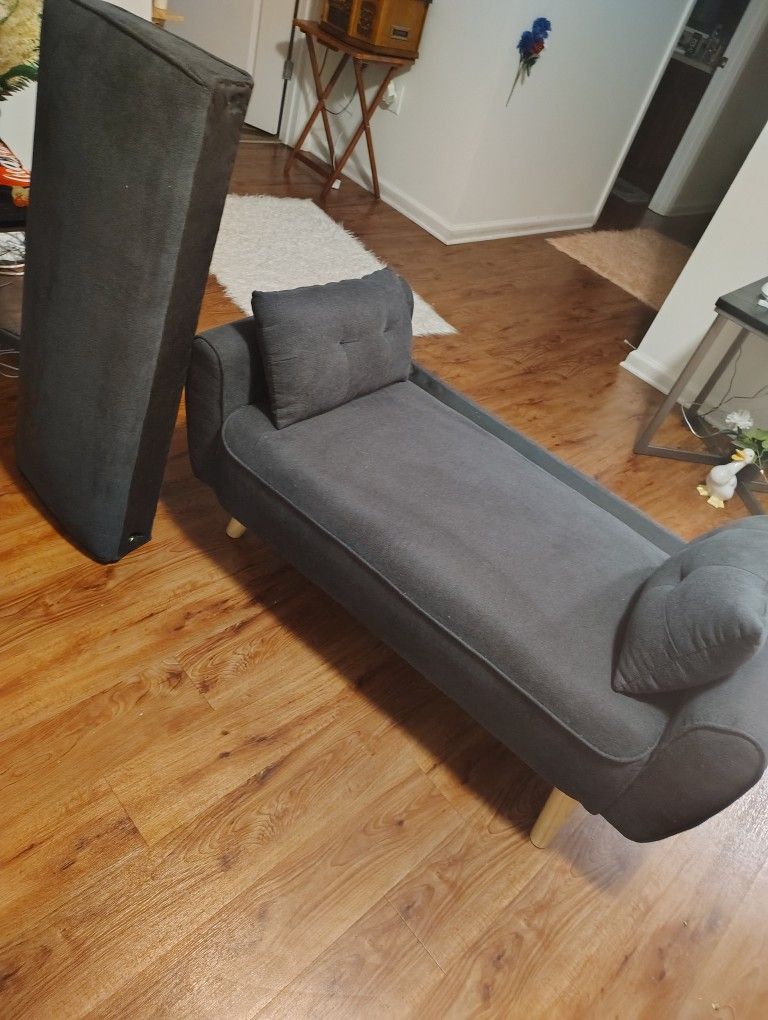 A CUTE LITTLE BLUE SOFA CAN HOLD UP TOO 300 _50 POUNDS 