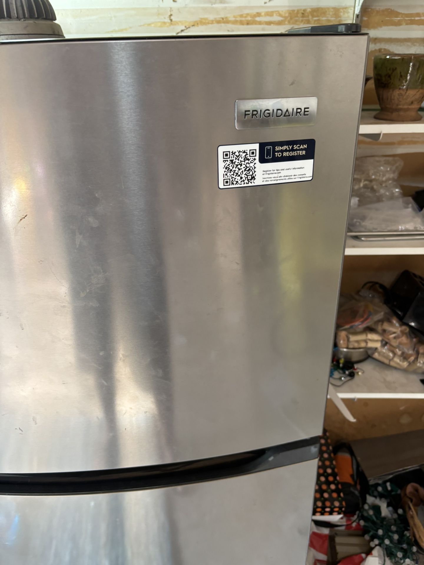 Refrigerator Freezer By Frigidaire 24 inches wide and 5 feet tall