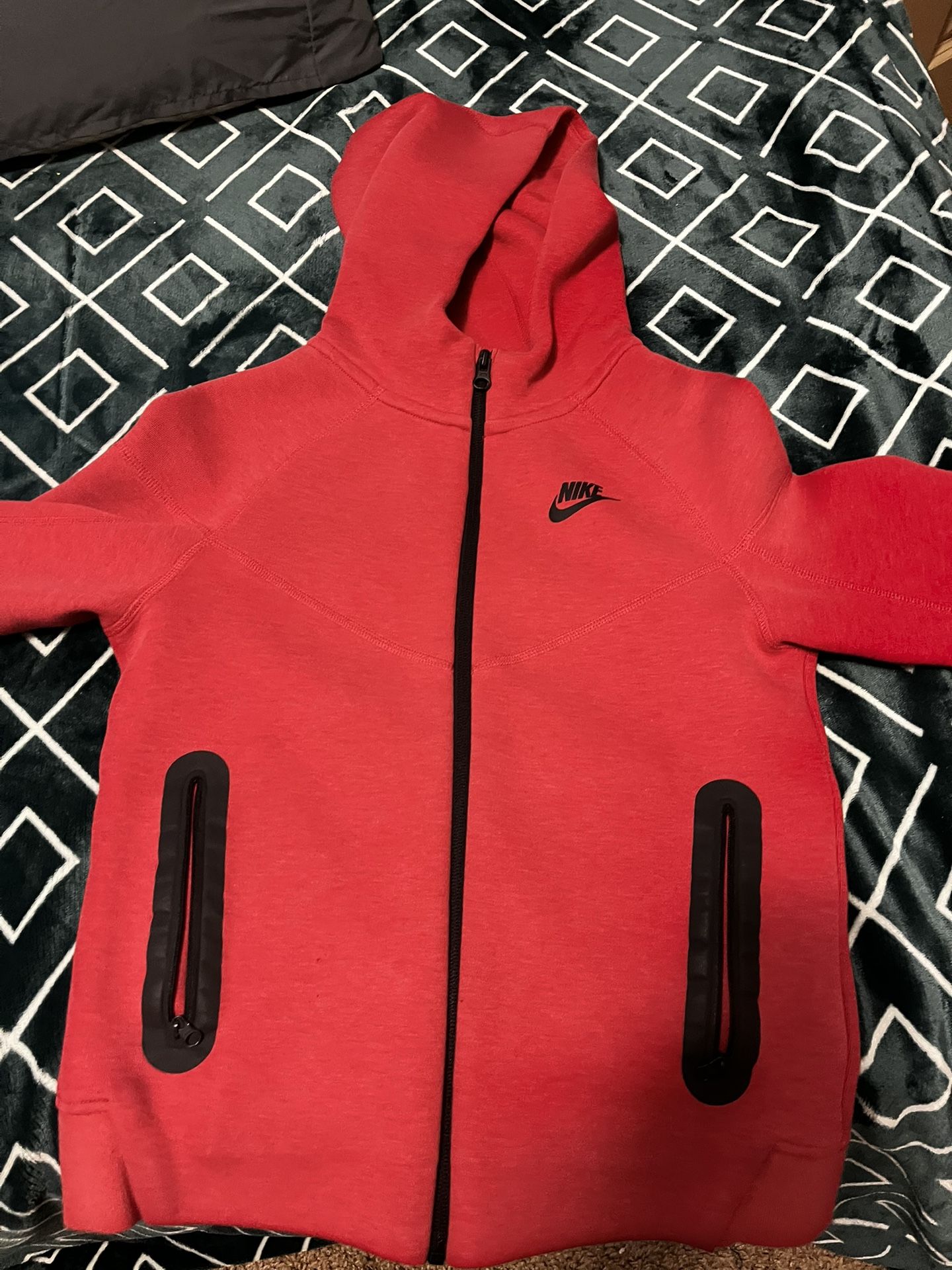 Red and black nike tech
