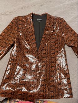 Danielle Bernstein snakeskin jacket