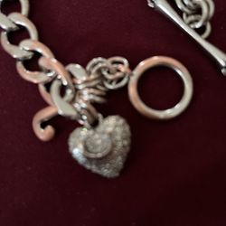 It’s A two color bracelet it’s for Women’s Made By Juicy Couture