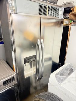 42 “ LG studio built in counter depth  refrigerator    Side by side stainless steel
