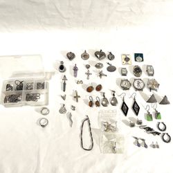 Huge Collection Of Vintage Solid, Sterling Silver Necklaces, Necklace Pendants, Earrings, Rings & Ladies Watches. There is one wind up automatic.