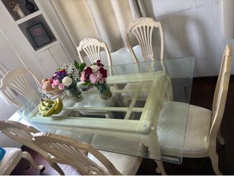 Elegant Glass dining table with 8 chairs