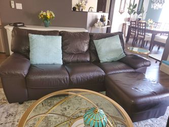 Leather Sofa And 2 Ottomans