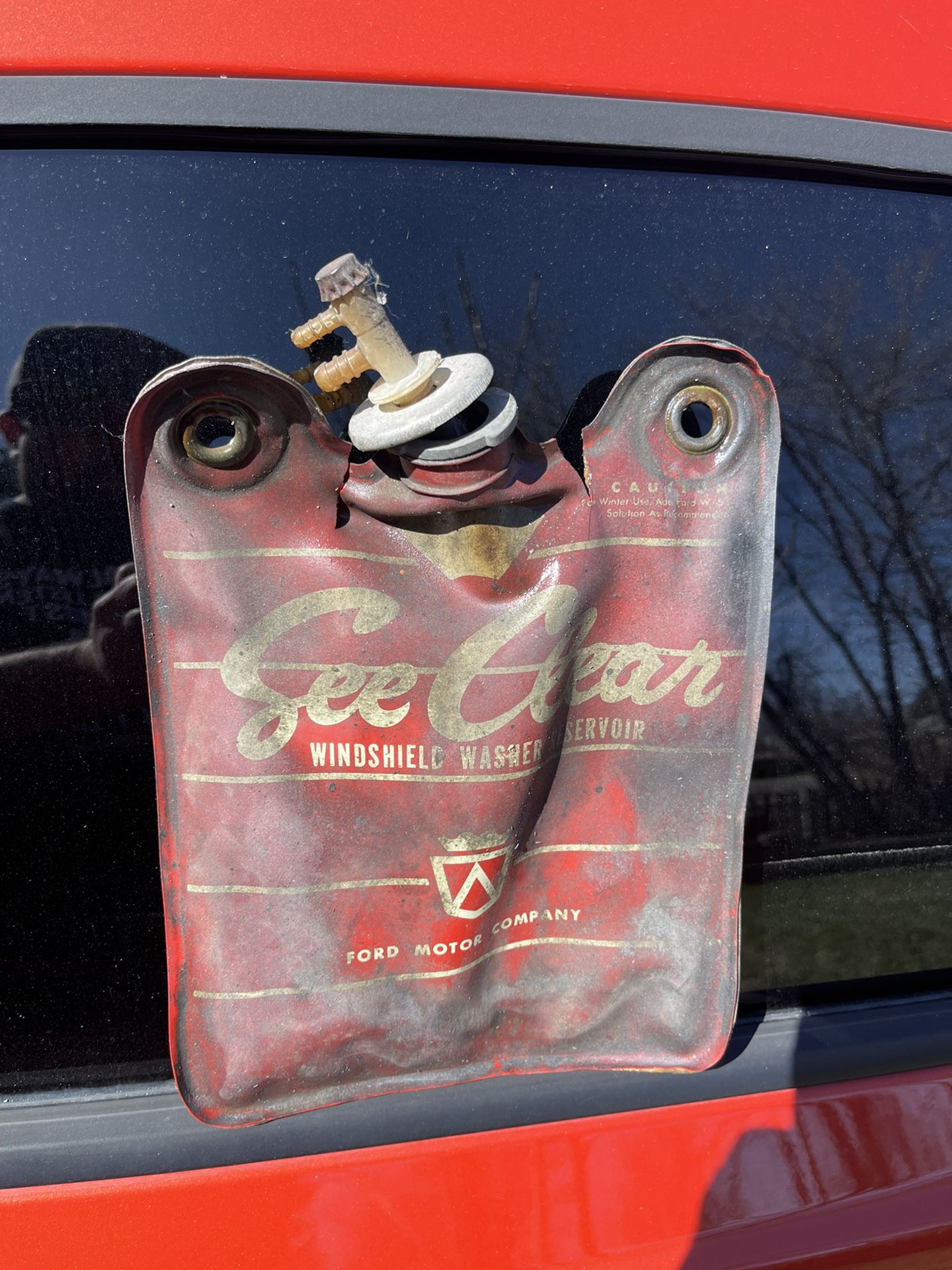 Vintage Ford motor company windshield washer fluid reservoir