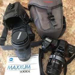 Camera And Two Lenses And Cases