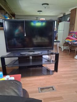 Tv and glass top table