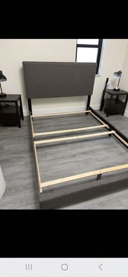 Full-size upholstered bed frame- Modern and like new!