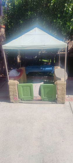 Playtime Patio and Kids Outdoor Playhouse Step2 brand