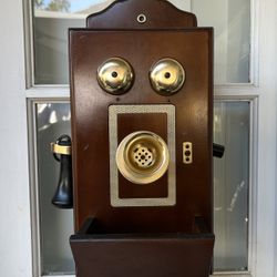 vintage novelty AM radio designed to look like an antique wooden wall telephone 1960s