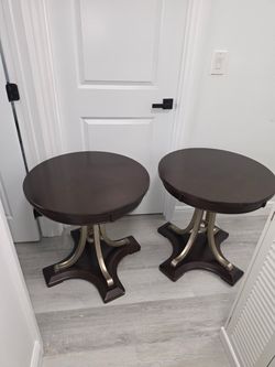 Pair of Round Dark Wood End Tables