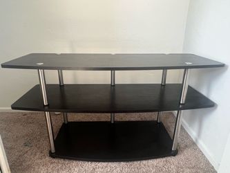 Black wood and metal entertainment center