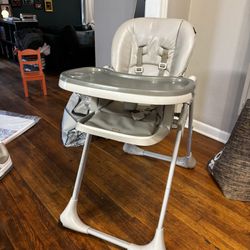 Booster seat with table