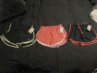 NWT WOMENS NIKE RUNNING SHORTE (3 For $20)
