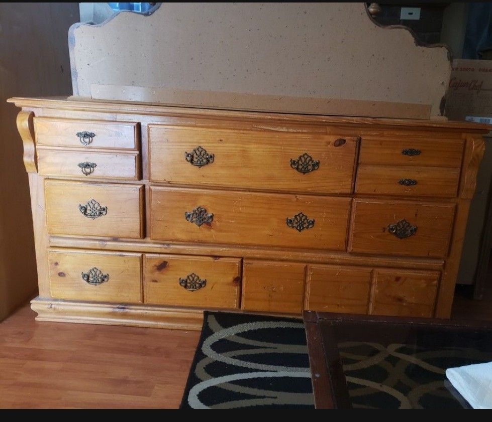 Dresser with tri-folding mirror